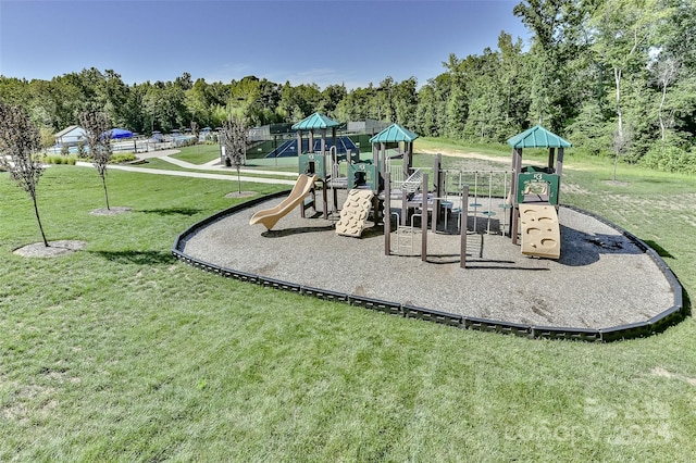 view of jungle gym featuring a yard