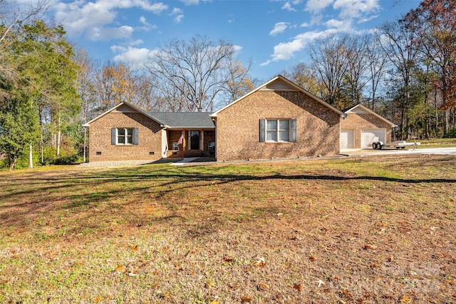 exterior space with a lawn and a garage