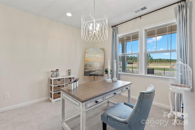 office area featuring a notable chandelier and light colored carpet