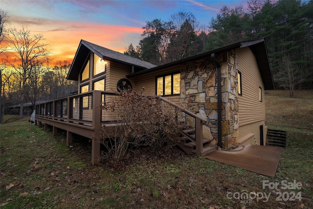 view of front of home with a deck