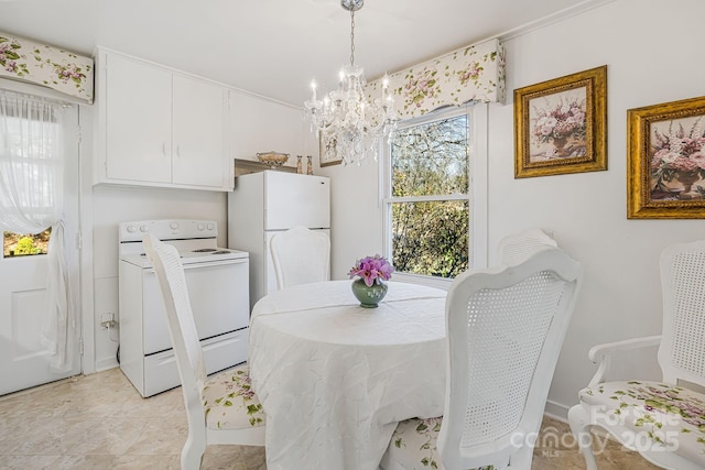 dining space featuring a chandelier