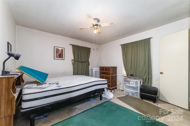 bedroom featuring ceiling fan