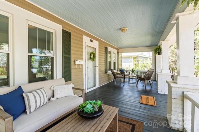 507 W 2nd Ave, Gastonia, NC 28052 - deck featuring a porch and outdoor lounge area