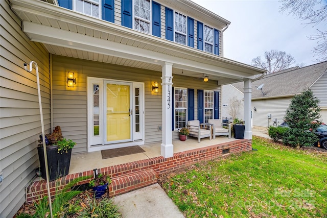 entrance to property featuring covered porch