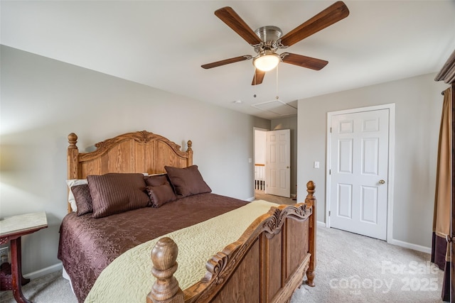 bedroom featuring ceiling fan and light carpet