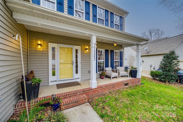 doorway to property with covered porch