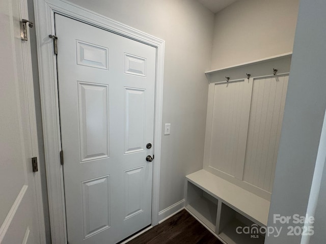 mudroom with dark hardwood / wood-style floors