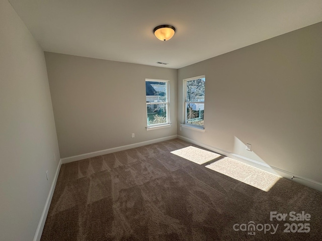 view of carpeted spare room