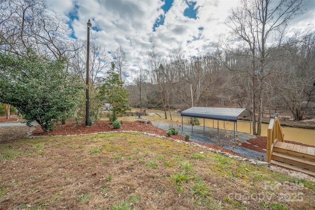 view of yard with a carport