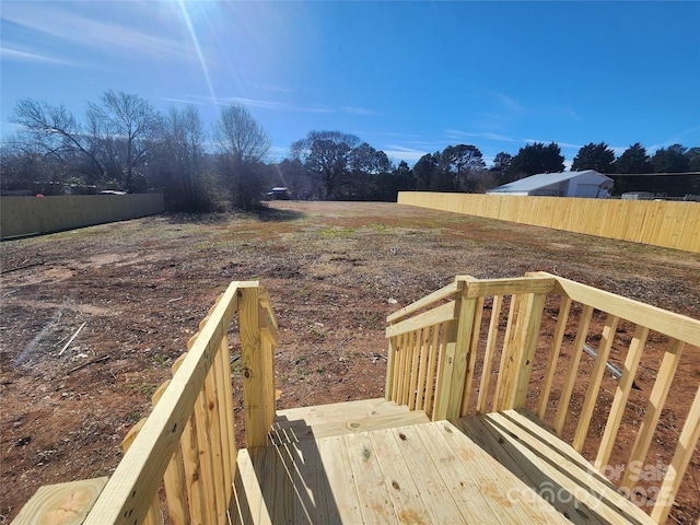 view of yard with a deck