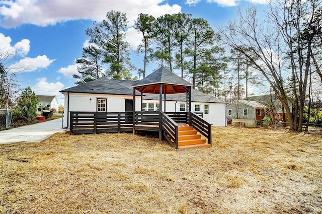 view of front of property with a deck