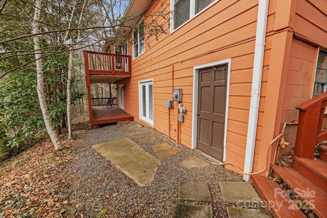 exterior space featuring a wooden deck