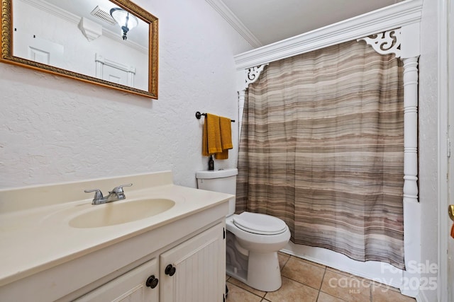 full bathroom featuring shower / tub combo with curtain, tile patterned floors, toilet, crown molding, and vanity