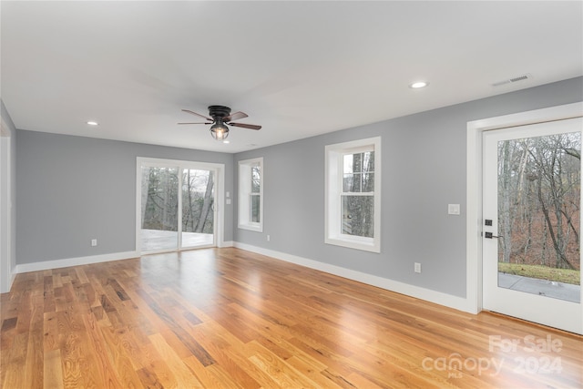 unfurnished room featuring ceiling fan and light hardwood / wood-style flooring