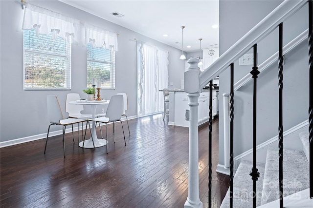 interior space with dark hardwood / wood-style floors