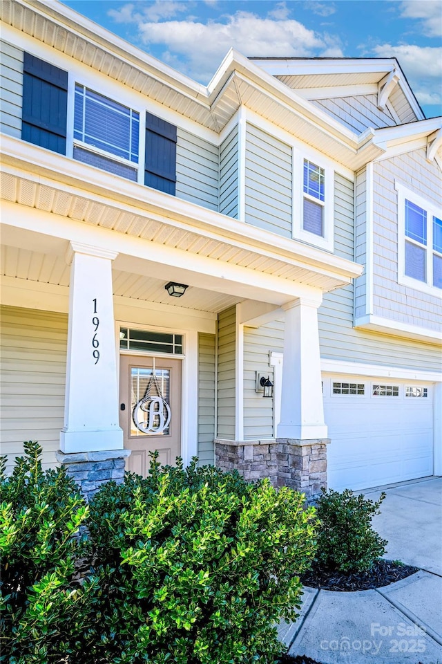 property entrance with a garage