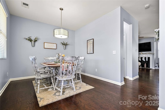 dining room featuring dark hardwood / wood-style floors