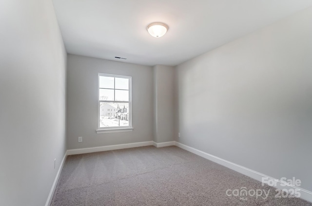 view of carpeted spare room