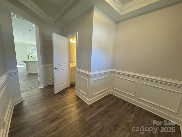 hall featuring crown molding, sink, and dark hardwood / wood-style floors