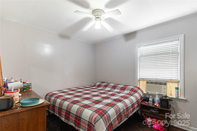 bedroom with cooling unit and a ceiling fan