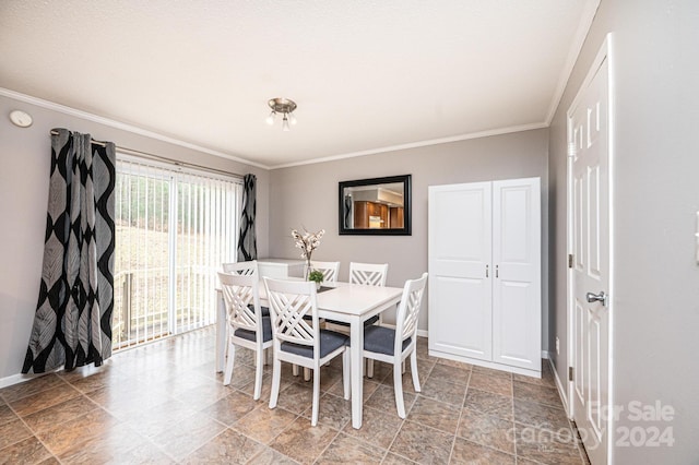 dining room with crown molding