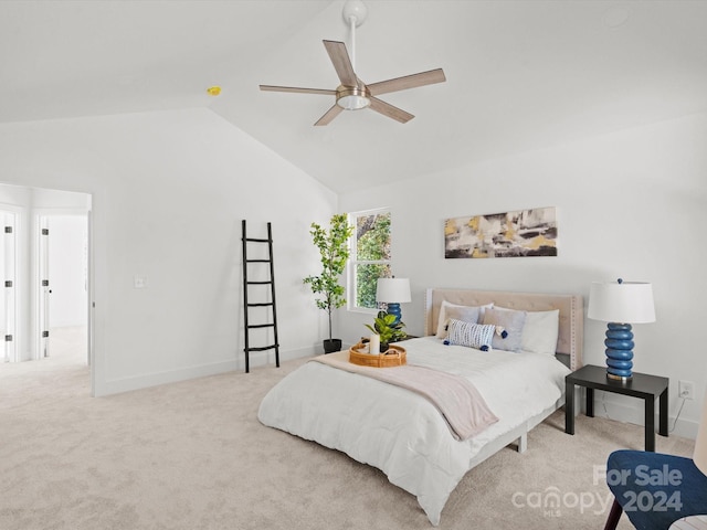 bedroom with carpet, vaulted ceiling, and ceiling fan