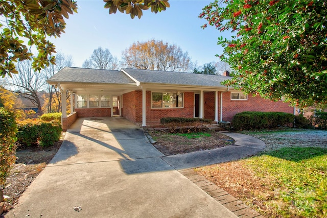 view of front of home with a carport