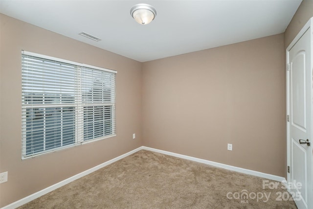 view of carpeted spare room