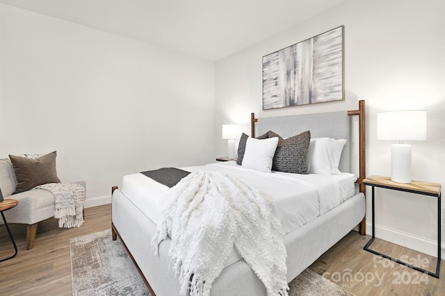 bedroom featuring hardwood / wood-style floors