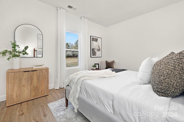 bedroom featuring light hardwood / wood-style flooring