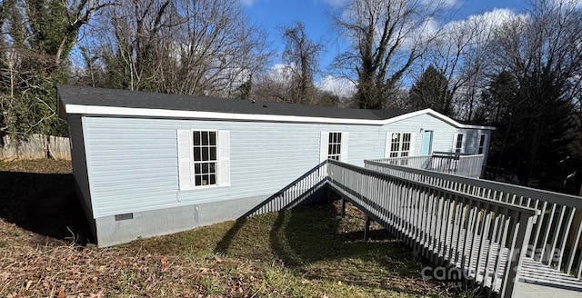 exterior space featuring a deck