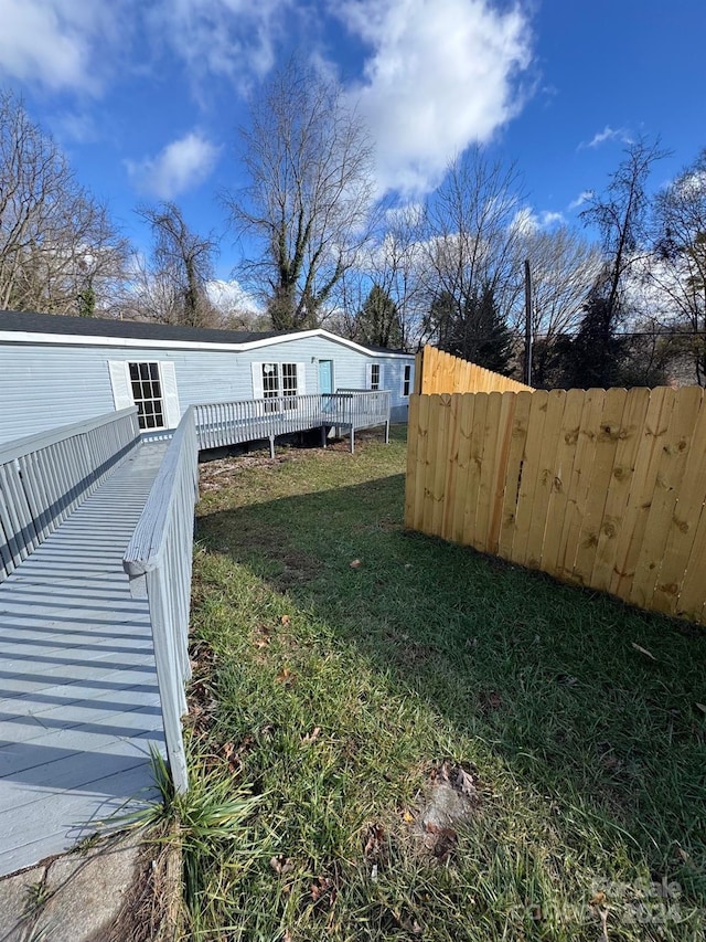 view of yard with a deck