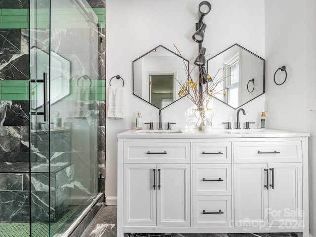 bathroom with vanity and walk in shower