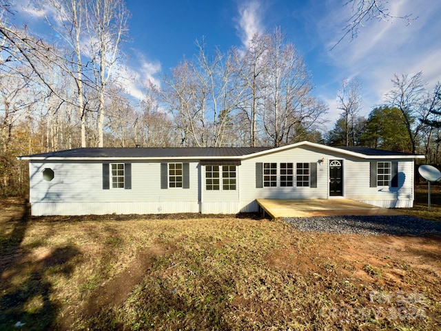 back of property with a patio area