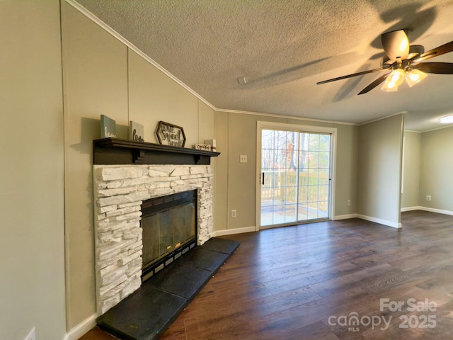 unfurnished living room featuring a fireplace, ornamental molding, dark hardwood / wood-style floors, and a textured ceiling