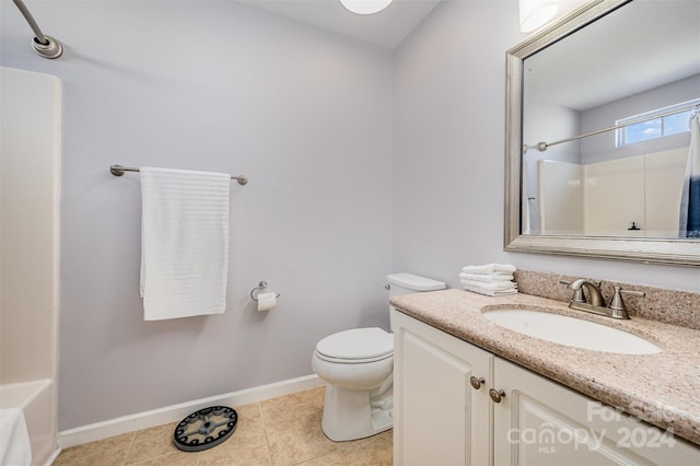 full bathroom featuring tile patterned flooring, vanity, bathtub / shower combination, and toilet