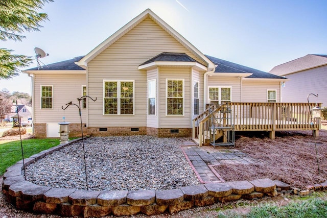 131 Quail Haven Dr, Troutman, NC 28166 - back of property featuring crawl space, a deck, and a shingled roof
