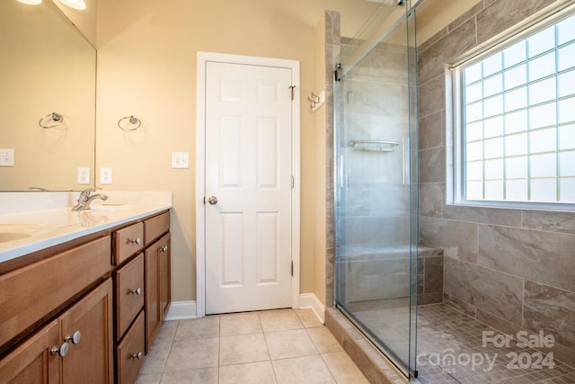 131 Quail Haven Dr, Troutman, NC 28166 - full bath featuring a shower stall, double vanity, and healthy amount of natural light