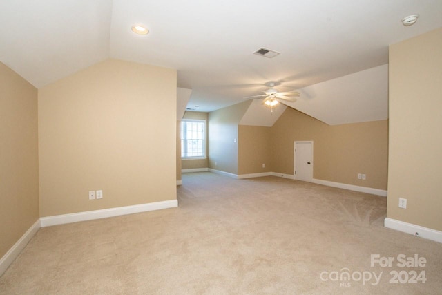 131 Quail Haven Dr, Troutman, NC 28166 - bonus room featuring vaulted ceiling, ceiling fan, and carpet flooring