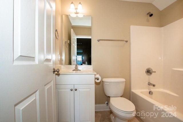 full bathroom featuring washtub / shower combination, tile patterned floors, lofted ceiling, toilet, and vanity