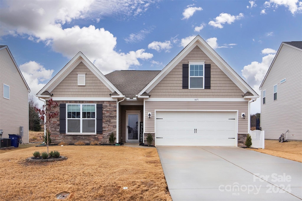 craftsman-style home with a garage