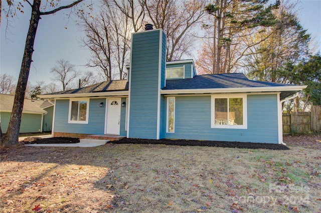 2515 Dion Ave, Charlotte, NC 28212 - view of front of house with a chimney and roof with shingles
