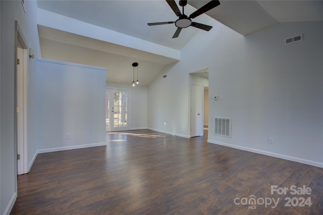 spare room with high vaulted ceiling, ceiling fan, and dark wood-type flooring