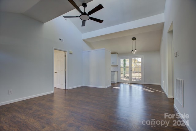 2515 Dion Ave, Charlotte, NC 28212 - unfurnished living room with a ceiling fan, dark wood-style floors, and high vaulted ceiling