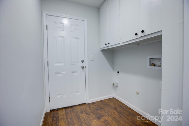 laundry room featuring hookup for an electric dryer, dark hardwood / wood-style floors, cabinets, and hookup for a washing machine