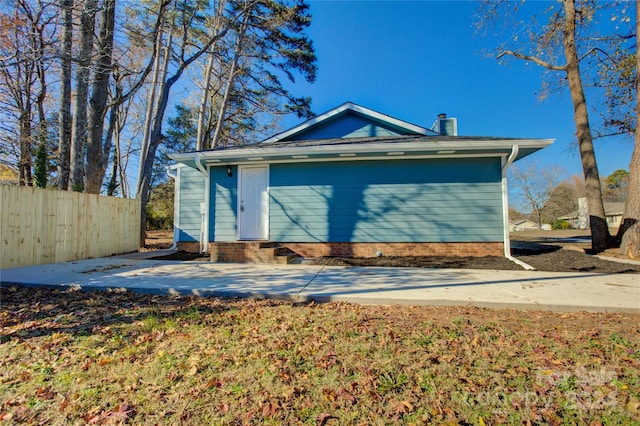 2515 Dion Ave, Charlotte, NC 28212 - view of front facade with entry steps and a chimney