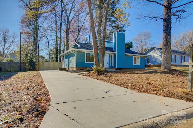 2515 Dion Ave, Charlotte, NC 28212 - view of front of property with a chimney and driveway