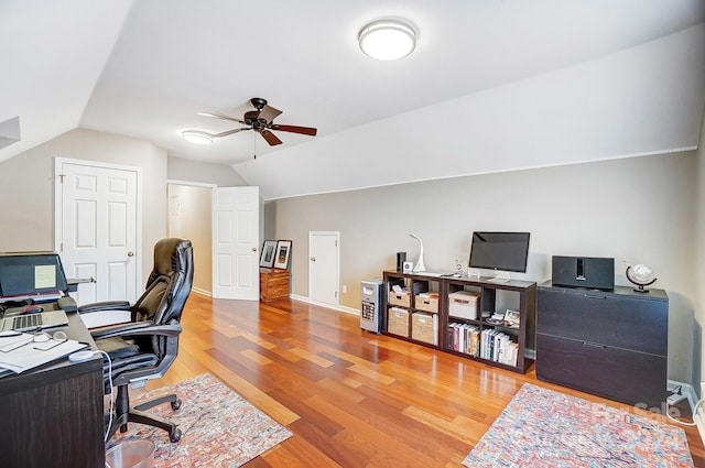 office space with wood-type flooring, ceiling fan, and lofted ceiling