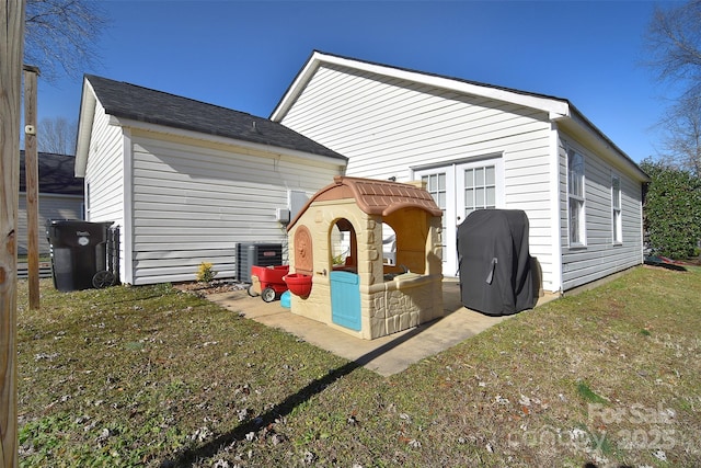 3076 Champion Ln SW, Concord, NC 28025 - back of property with a lawn