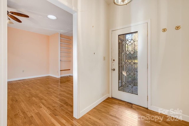 entrance foyer with ceiling fan and light hardwood / wood-style floors